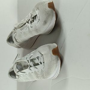 Nike, Woman Flyknit Trainer White/Gum Sole Shoes that Size 8.5.